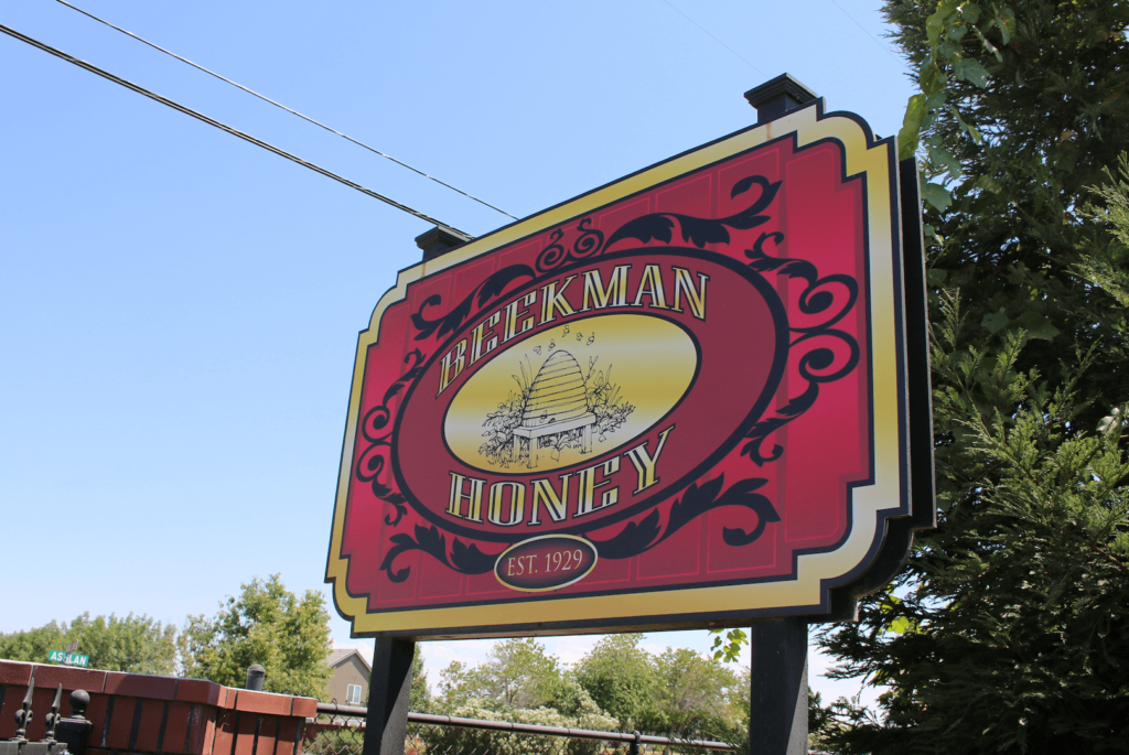 Photo of a sign that reads: Beekman Honey