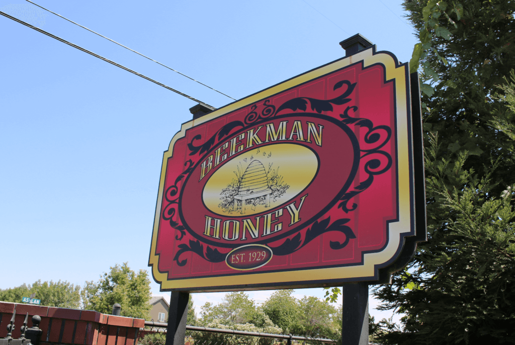 Photo of a sign that reads: Beekman Honey