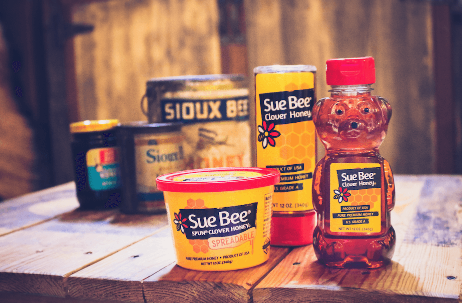 Photo of Sue Bee® honey containers.