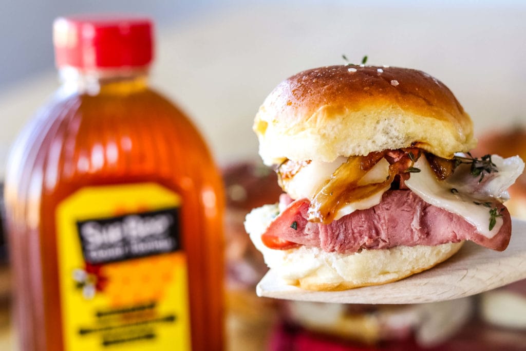 Photo of beef sandwich slider and SUE BEE® honey.