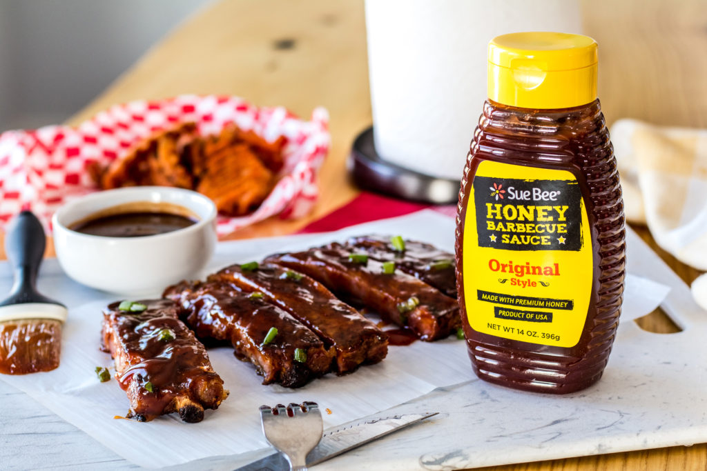 Honey BBQ ribs and SUE BEE® Original Style Honey Barbecue Sauce.
