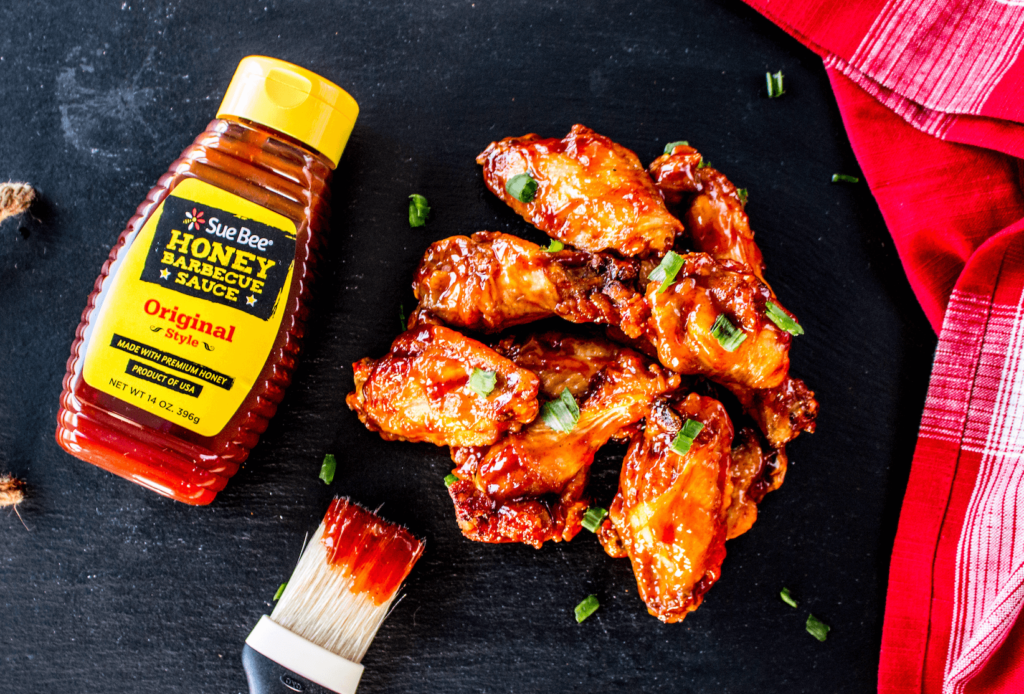 BBQ chicken wings and SUE BEE® Original Style Honey Barbecue Sauce.