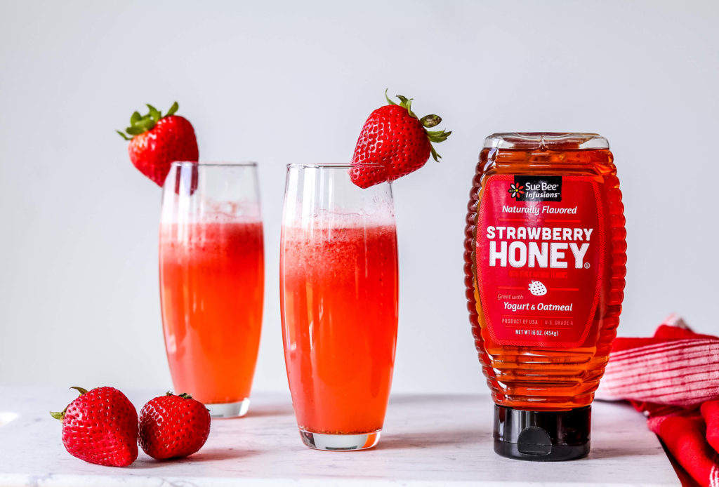 Strawberry Bellini craft cocktail made with SUE BEE® INFUSIONS™ Strawberry honey.